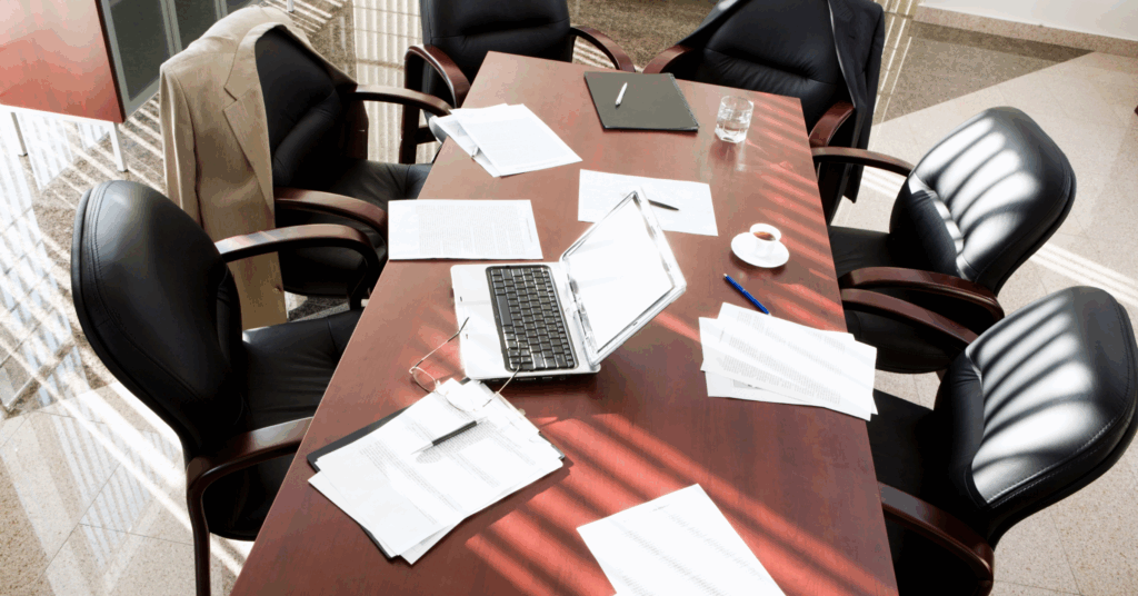table with legal operations papers scattered on it
