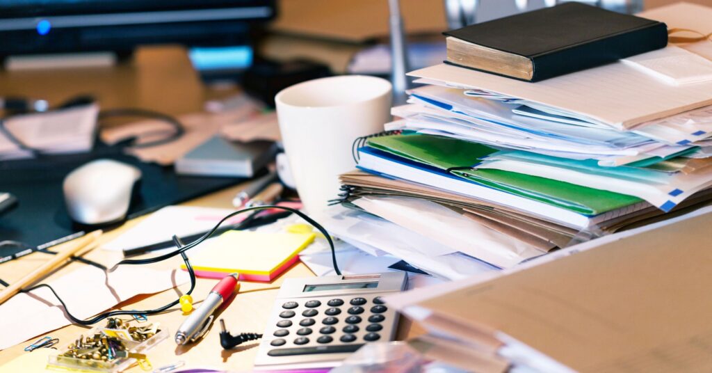 early signals missed in legal spend - messy desk